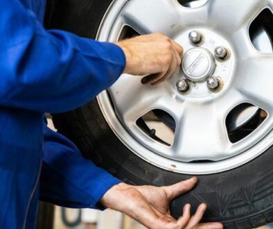 Qualified mechanic performing a full car service on a modern vehicle at Homerton Car Repairs, your local E9 garage.