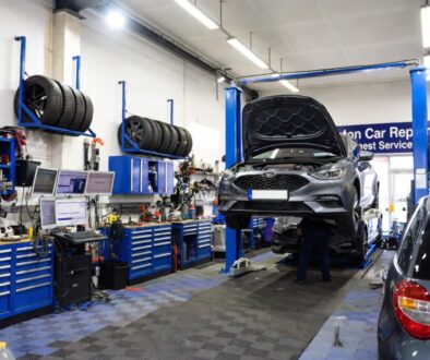 Split-scene comparison showing a frustrated driver holding an expensive main dealer invoice next to a smiling mechanic from Homerton Car Repairs in Hackney holding a tablet with a fixed-price affordable quote.