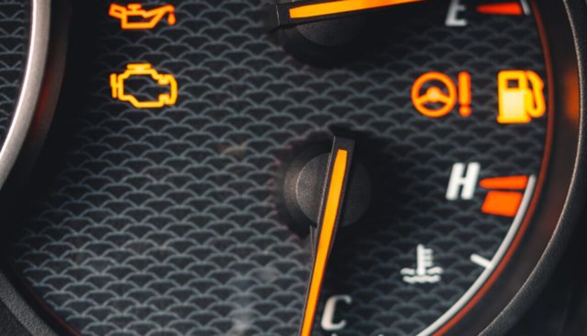Dashboard warning lights explained — engine management, battery, and tyre pressure symbols on a car dashboard at Homerton Car Repairs, Hackney.